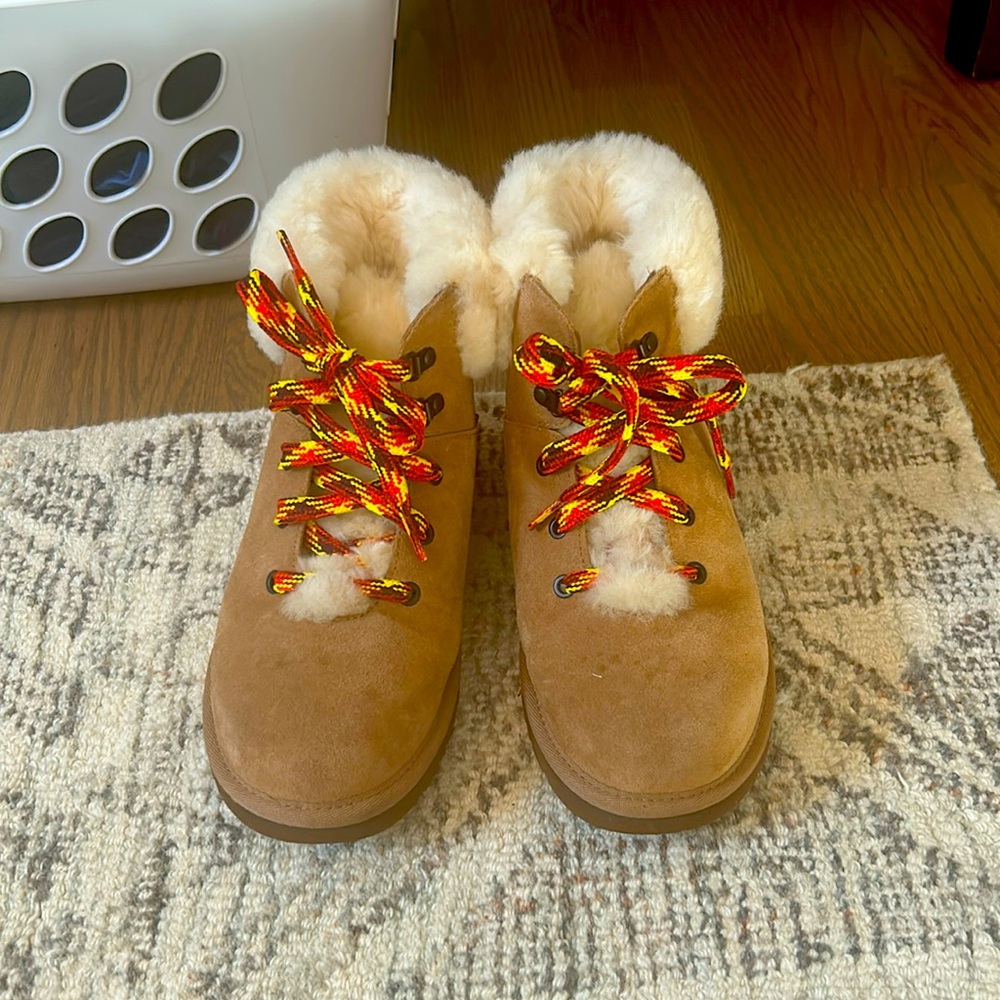 Women’s size 8 lace up brown UGG boots. These are so warm with real fur lining.